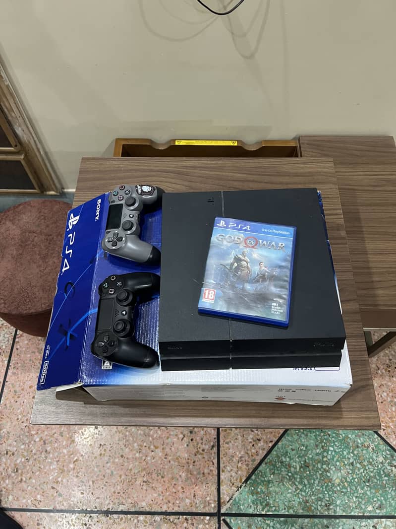 PS4 fat with extra controller and disc 0