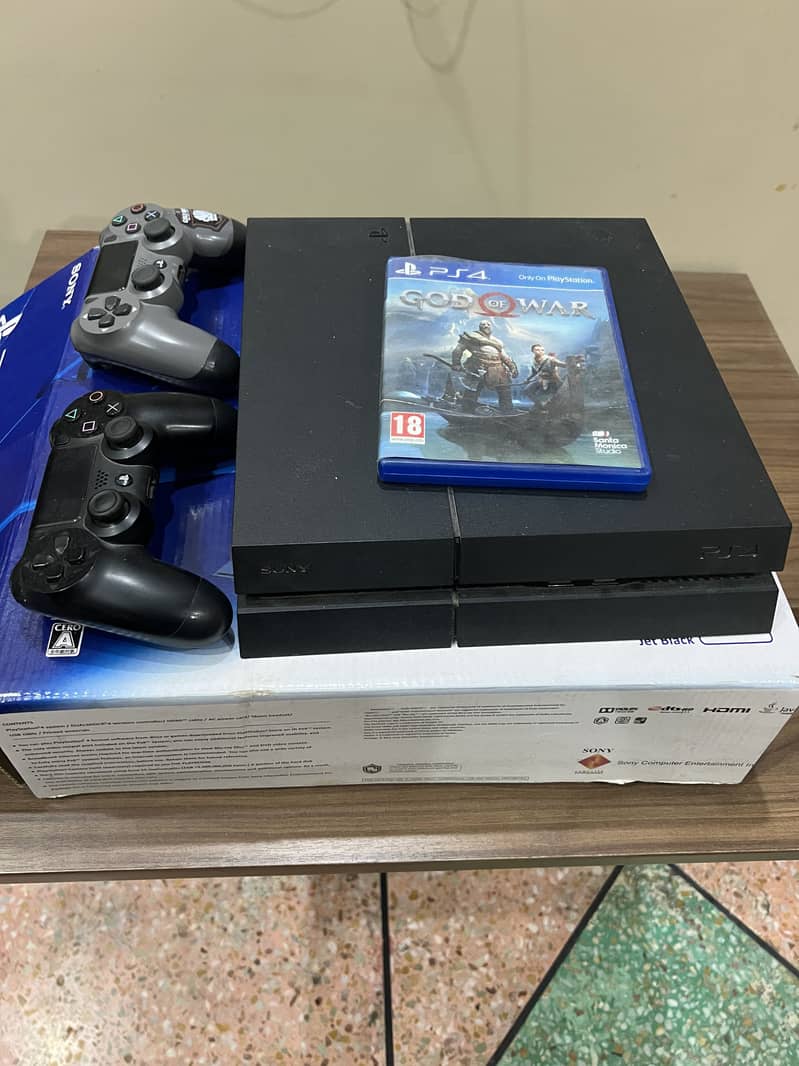PS4 fat with extra controller and disc 1