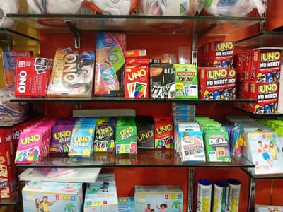 Pokemon, uno and monopoly deal cards available read description