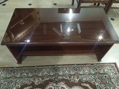 Center Table set with two side tables with glass top.