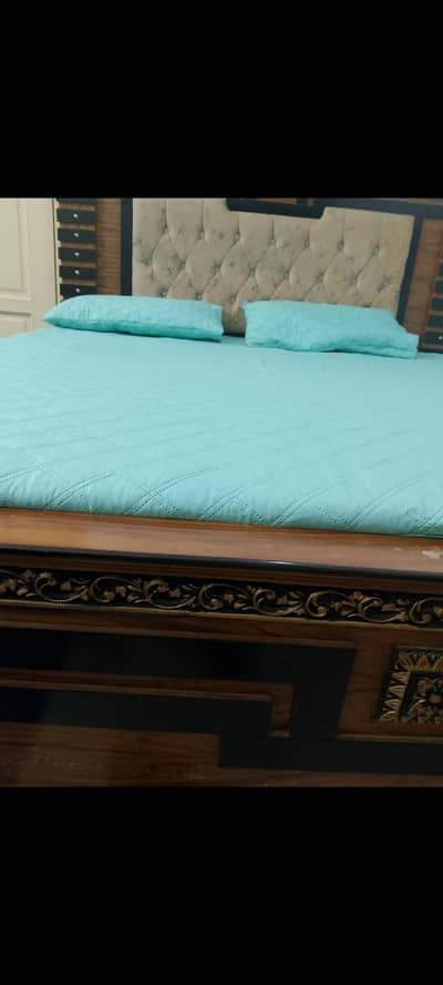 wooden double bed