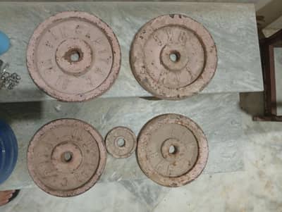 Weight Plates and Iron Rod.