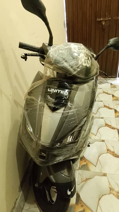 united Scooty 100cc mint condition 2026 like new