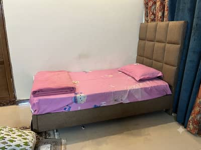 Single upholstered bed for sale
