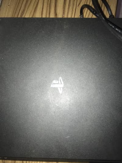 Play station 4 in good condition with 2 controls on 1 disk
