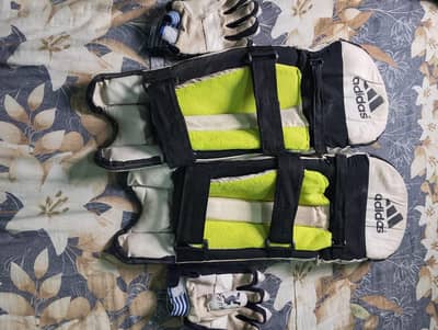 cricket pads and gloves