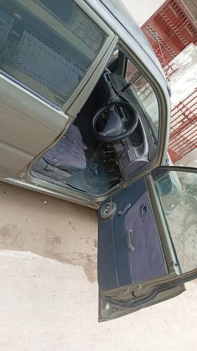 Daihatsu Cuore 2003 inside original outside shower