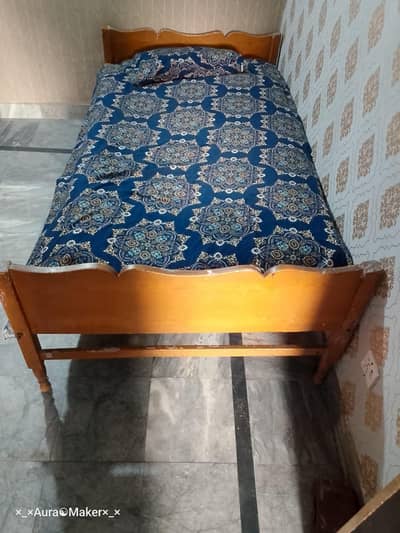 Single wooden bed and dressing