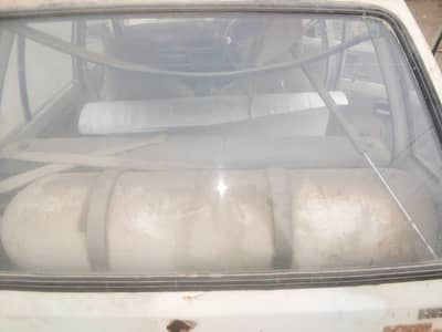 cng cylinder small kit copmplete saman k sath mehran main laga hua