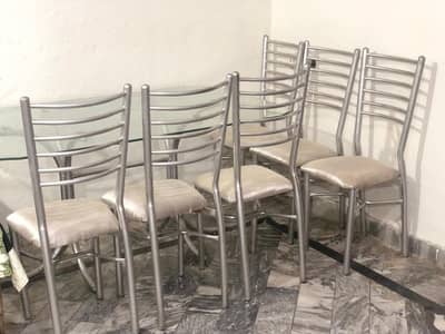 Glass Dinning table with 6 chairs