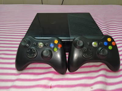 Xbox 360 E Slim Edition with 2 controllers and 9 pre-installed games