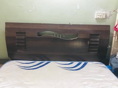 wooden double bed