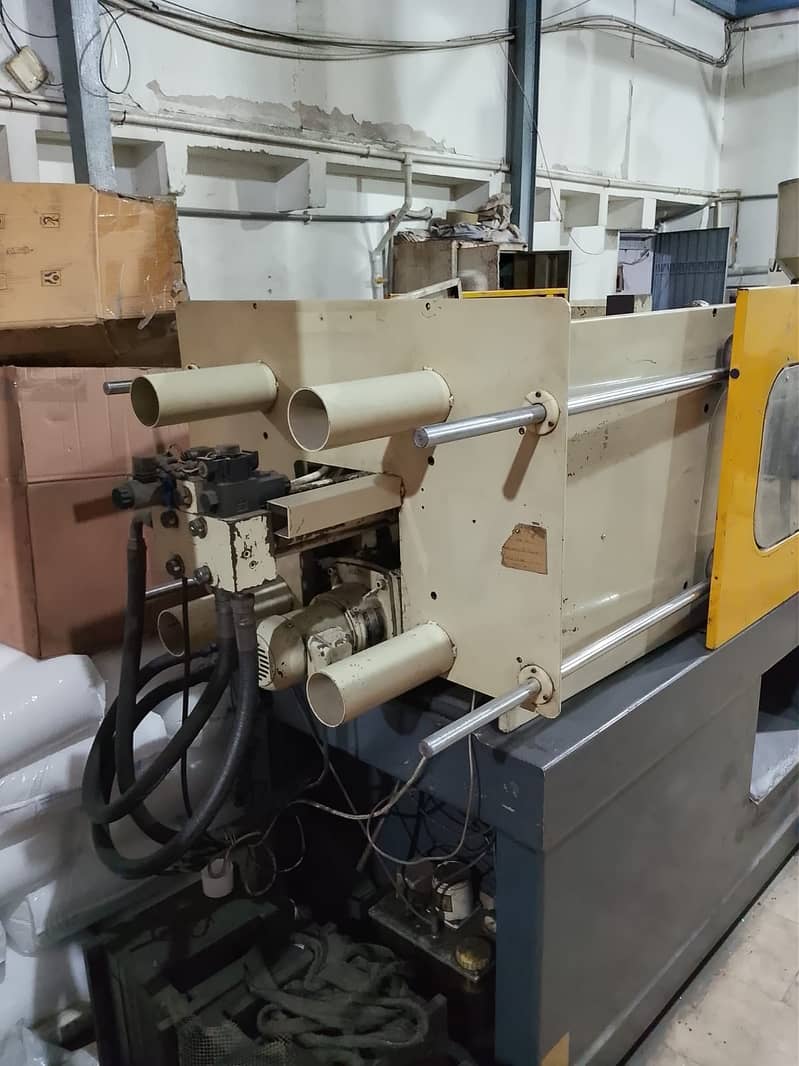 Injection molding machine 12
