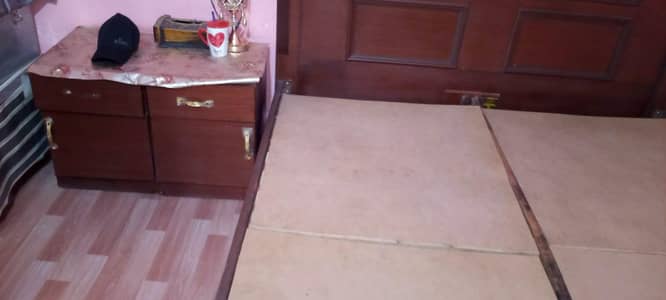 bed  condition 10 by 10 with two side table just like new