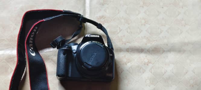 DSLR with two extra lena