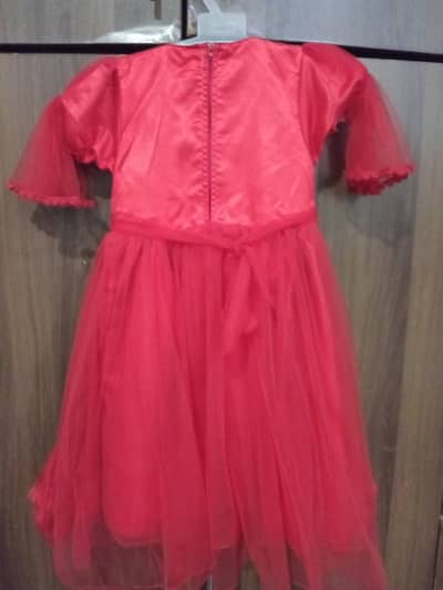 beautiful red frock available for baby girl from 4 to 5 years of age