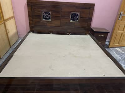 Bed with side tables and foam