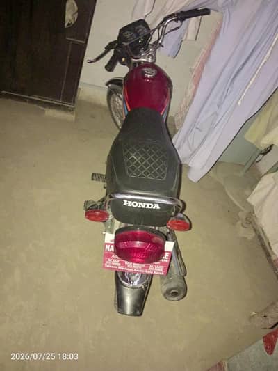 Honda 125 red colour 24 model form ma hain location chokara