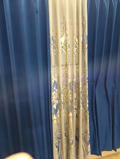12 curtains can fit 4 large windows almost new