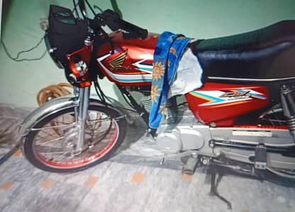 honda 125 total  nut 2 nut genuine
