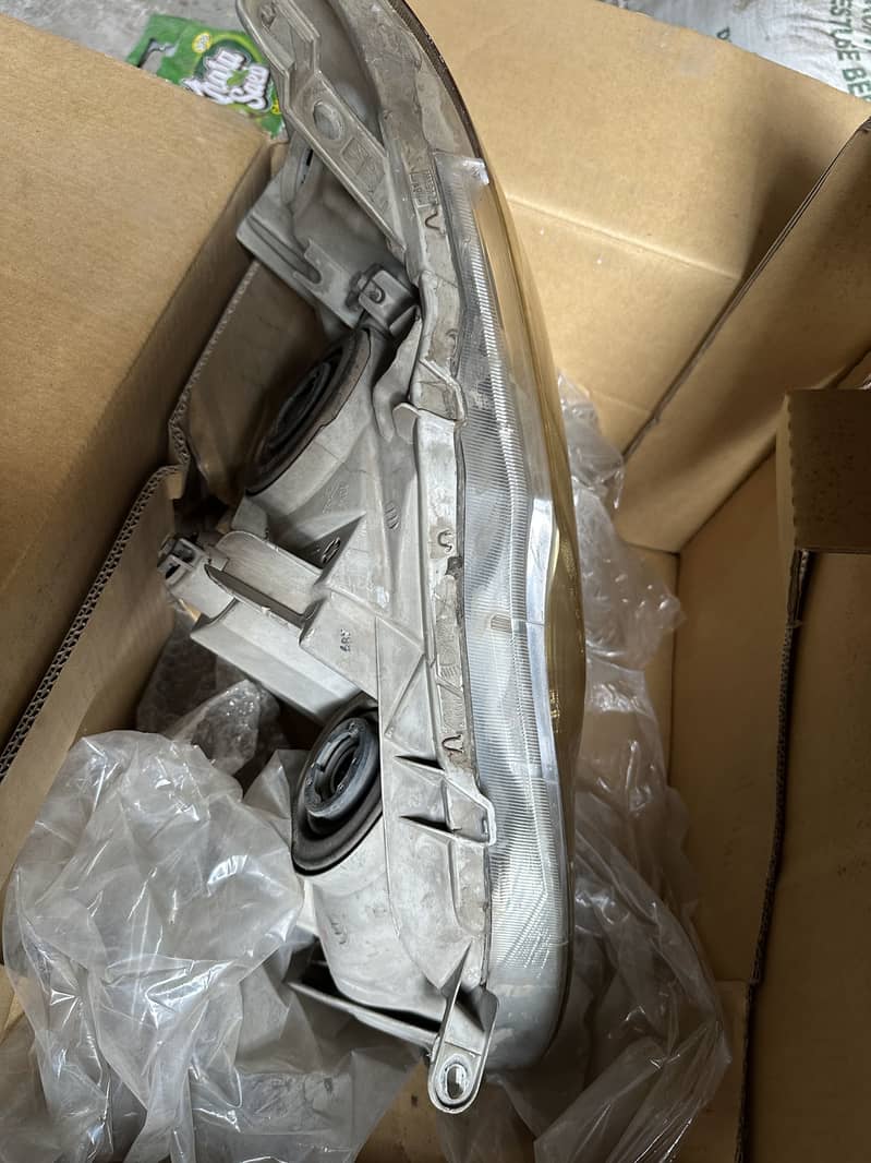 Passenger Side headlight 5