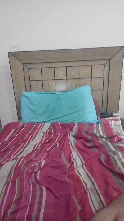 Single bed with side table