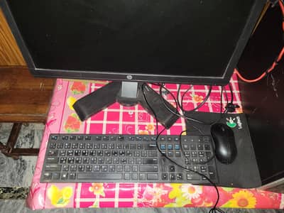 complete setup with monitor, keyboard, mouse