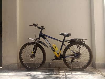 bicycle for sale with front and back gayer in good condition