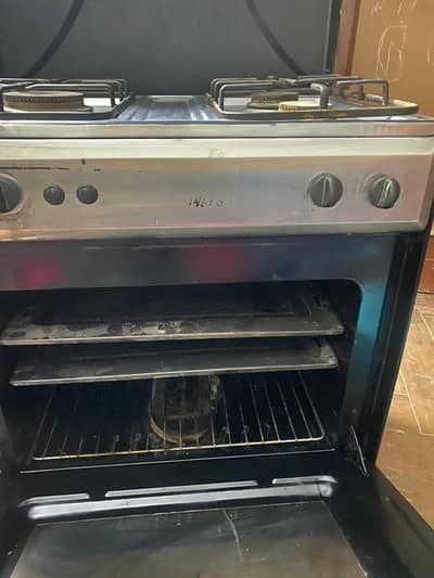 Cooking range with stove and down baking oven