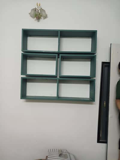 Wall mounted book shelves.