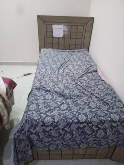 Single bed with side table