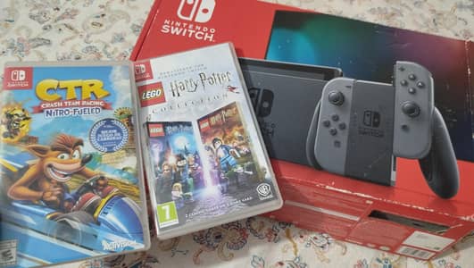 Used Nintendo switch V2 + 2 games