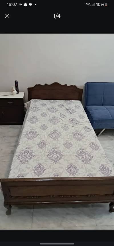 Single bed of solid wood with side table and mattress