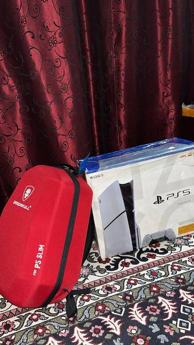 Ps5 slim with 2 controllers and travelling bag 10 days used