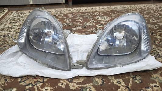 TOYOTA VITZ 2000 TO 2003 HEADLIGHTS CONDITION 9/10 JUST LIKE NEW