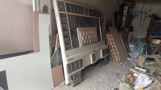 wooden bed in good condition