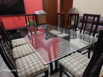 8 chairs Dining table ( un-used dining set ) it’s literally brand new