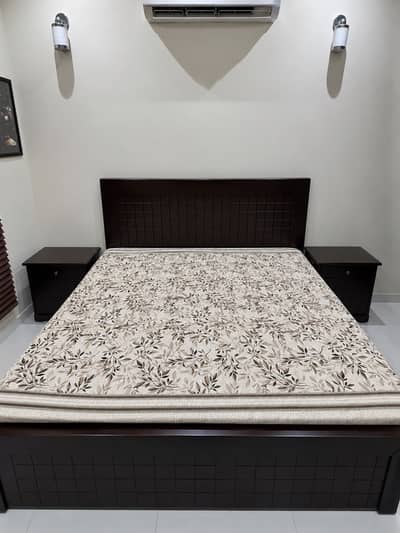 Wooden chocolate brown bed