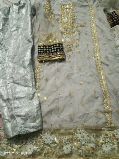 3pc net dress new jese condition mein hai