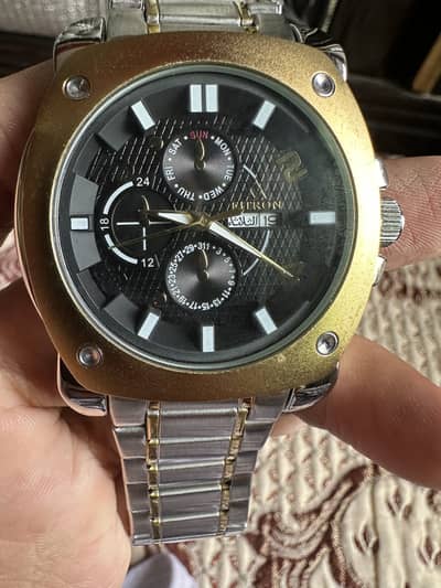 Fitron Arabic Model Watch With Two Extra Watch Band Links.