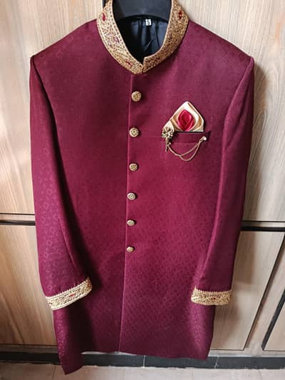 Barat Groom dress with qulla.