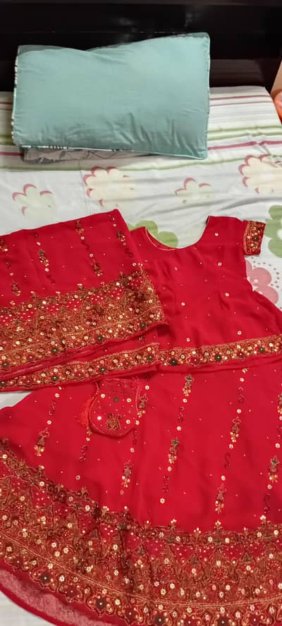Medium size Bridal Lehanga in good condition is available