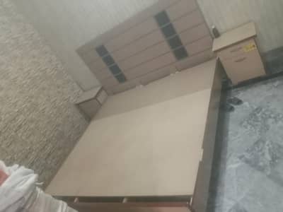 wooden bed and side tabel