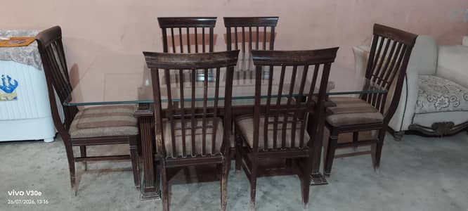 Solid glass dining table with 6 chair's