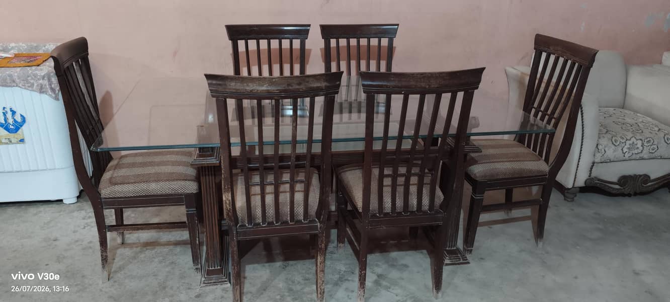 Solid glass dining table with 6 chair's 0