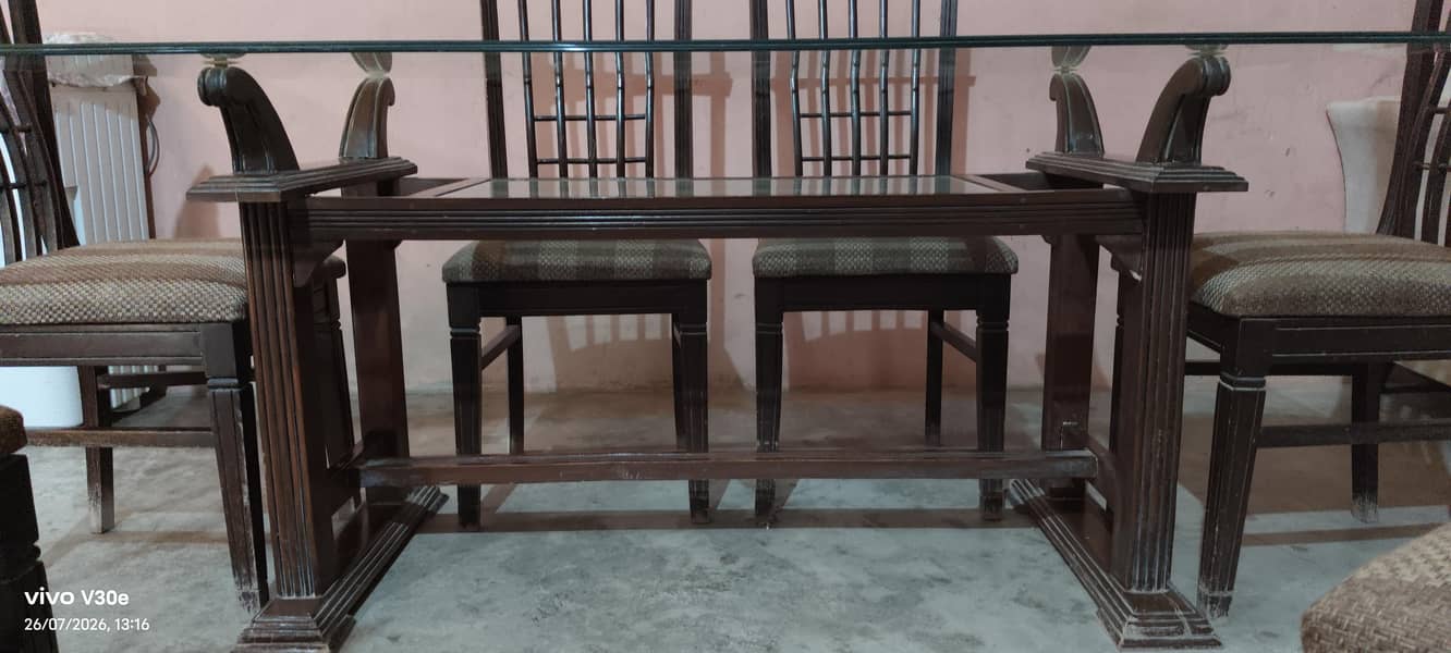 Solid glass dining table with 6 chair's 1
