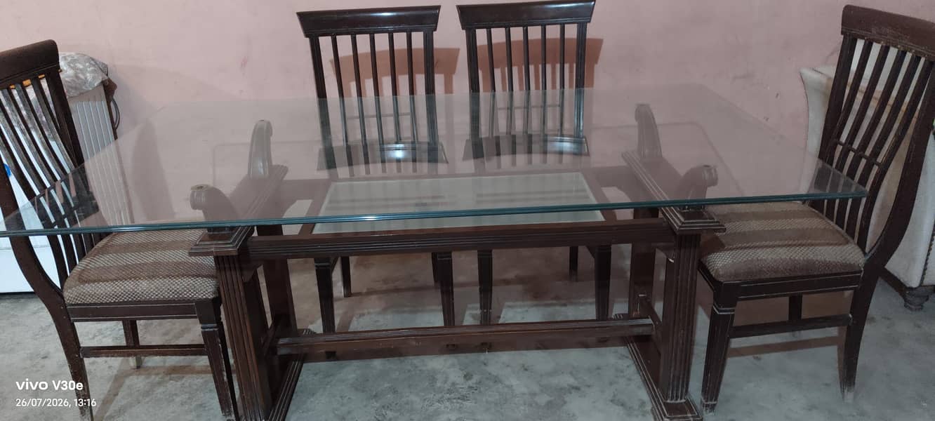 Solid glass dining table with 6 chair's 2