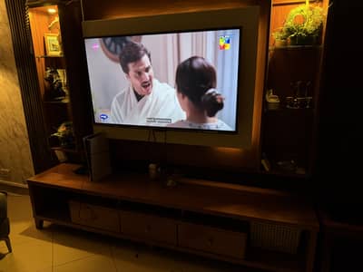 TV unit with console and side racks