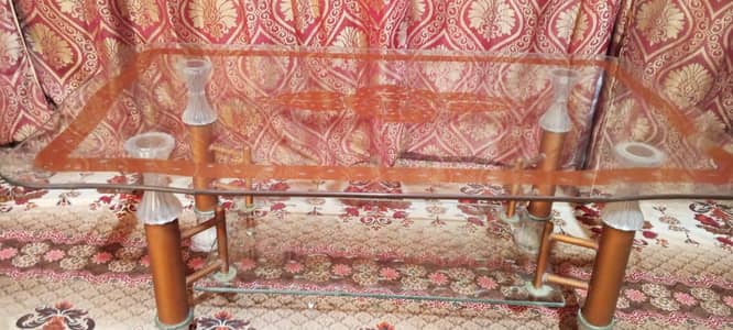 Two floor center glass table