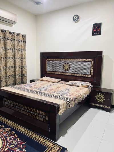 double bed with side tables